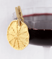 cocktail garnish attached to glass rim