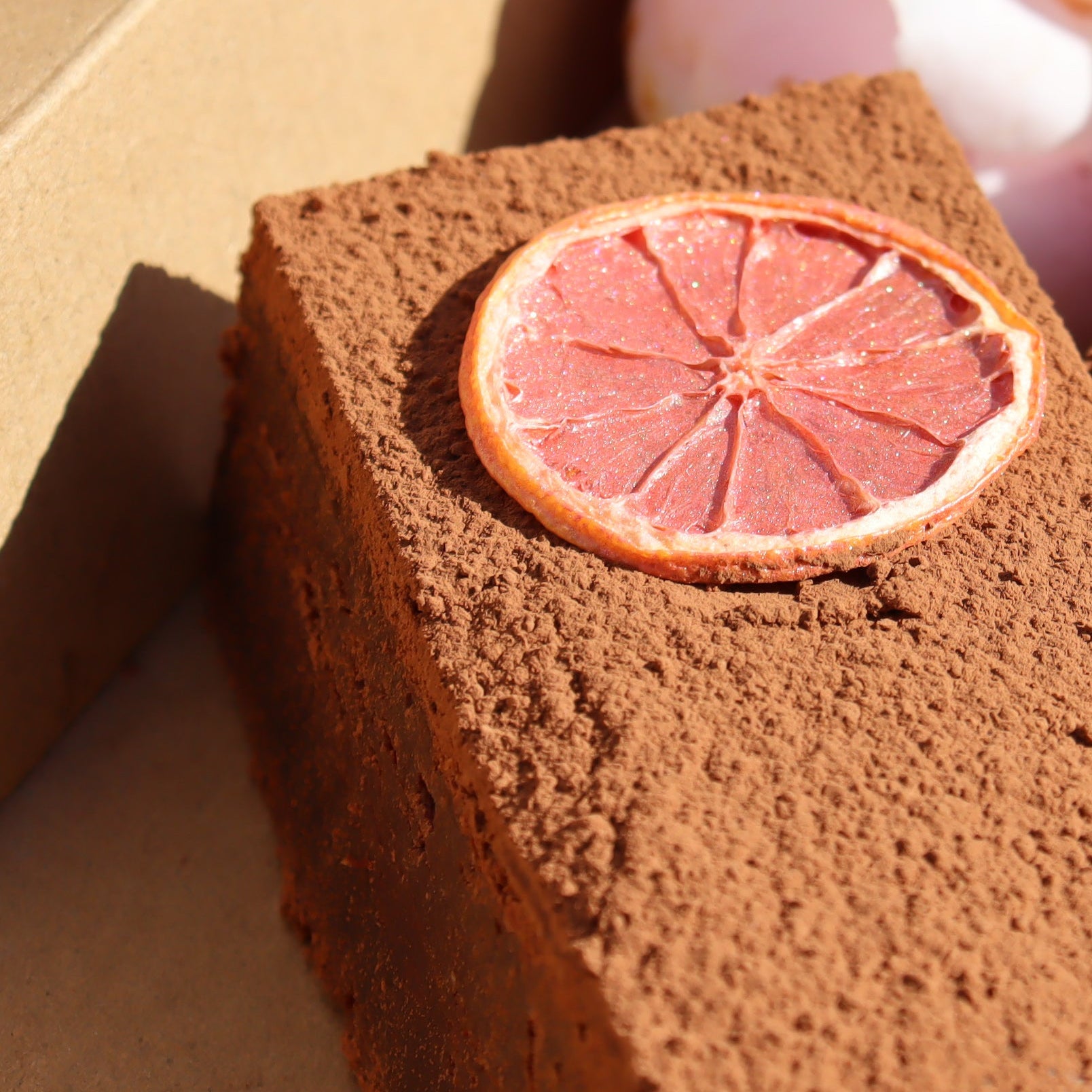 colourful lemon on a piece of cake