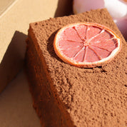 colourful lemon on a piece of cake